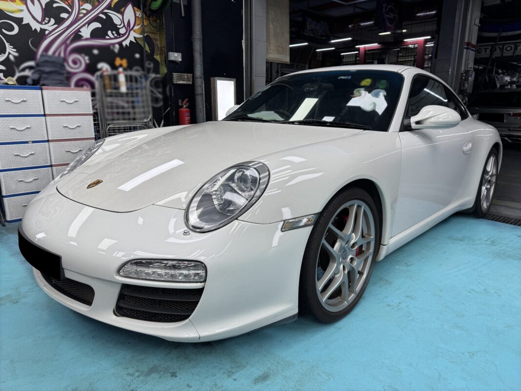 The white Porsche 911 Carrera S as it arrived at Revol Carz, before the respray.