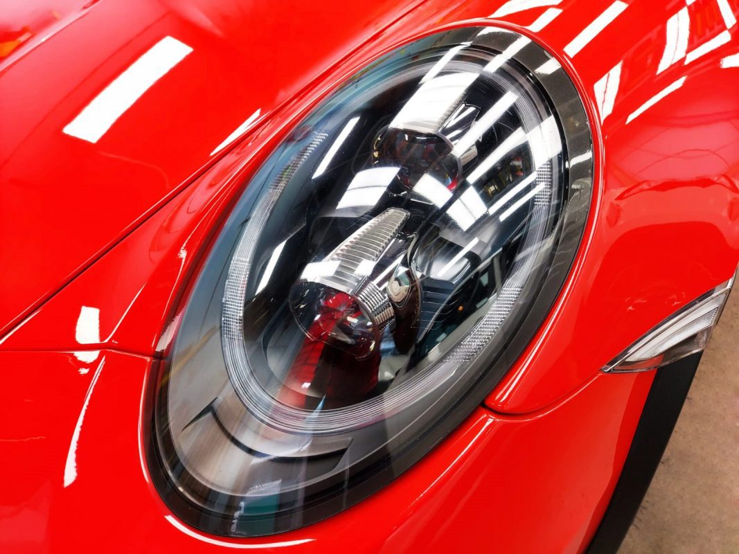 The 911 GT3 RS's coated paintwork showing clean reflections.
