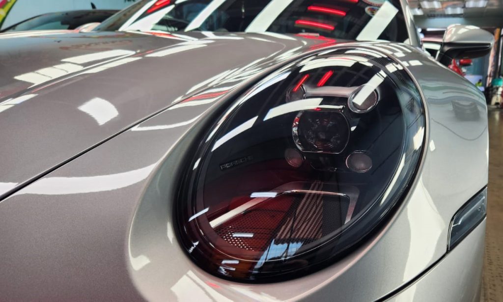 The Panamera's coated paintwork showing clean reflections.