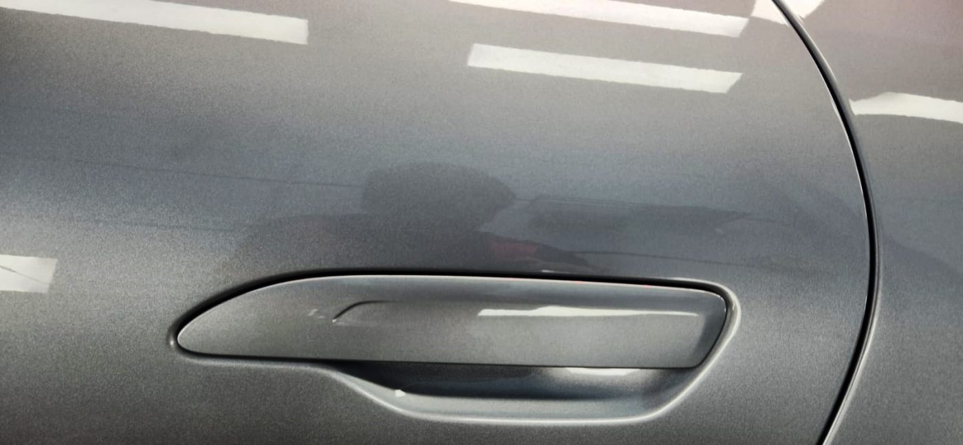 Front three-quarter view of the 911 Panamera after coating.