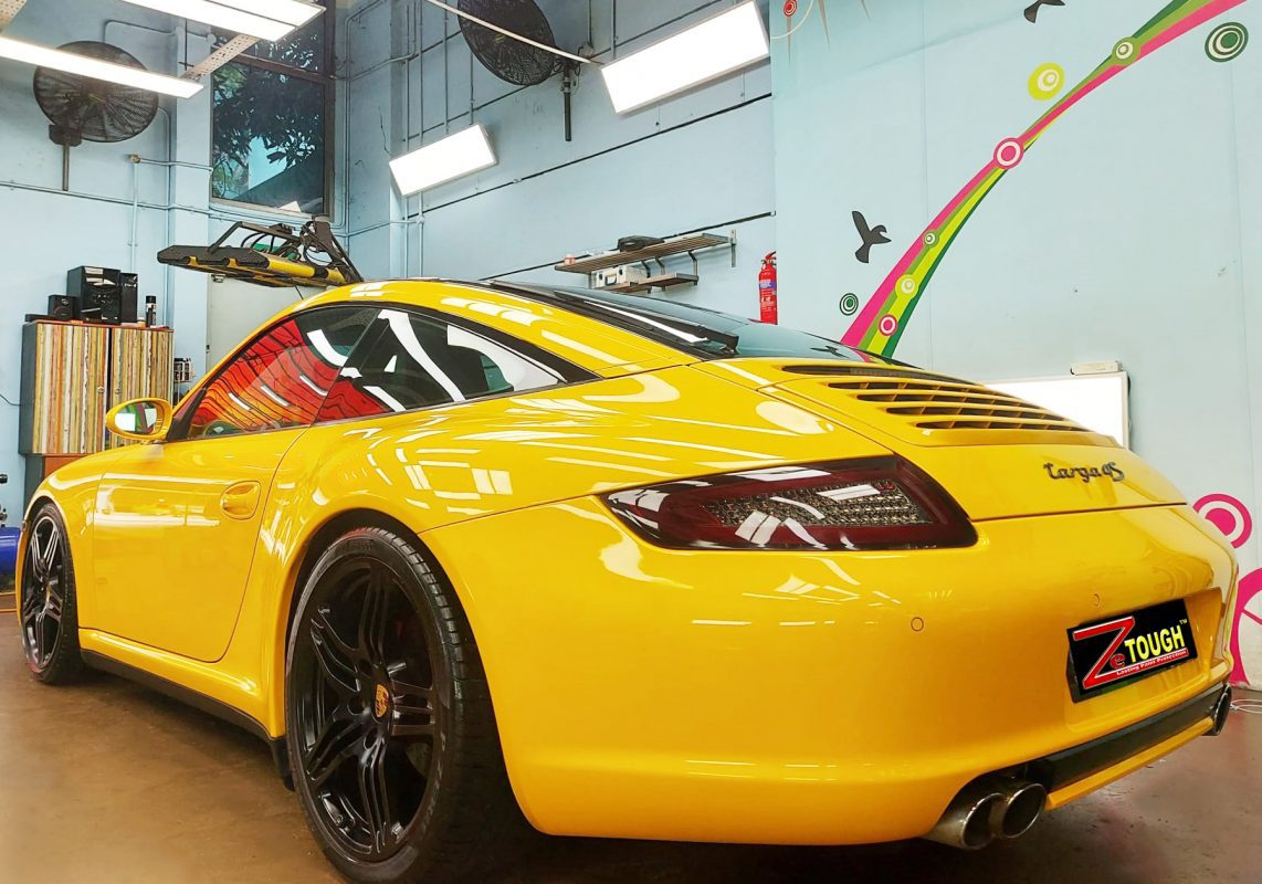 Rear quarter of the 911 Targa, glossy and protected.