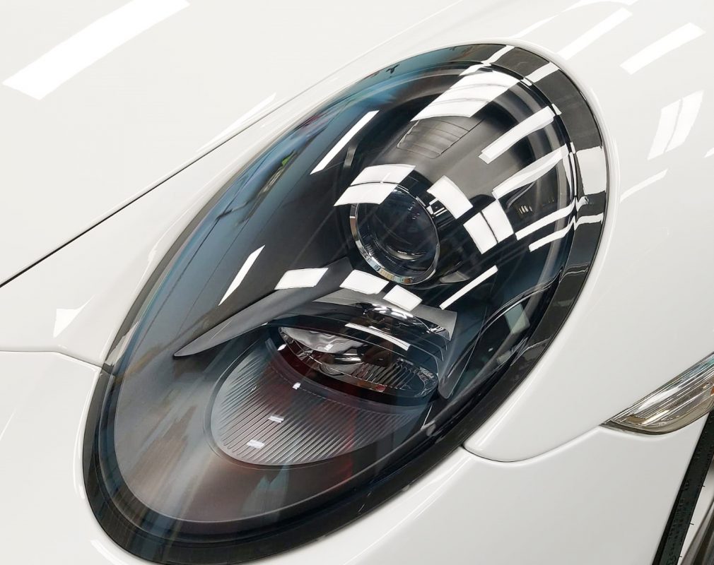 The 911 Targa's coated paintwork showing clean reflections.