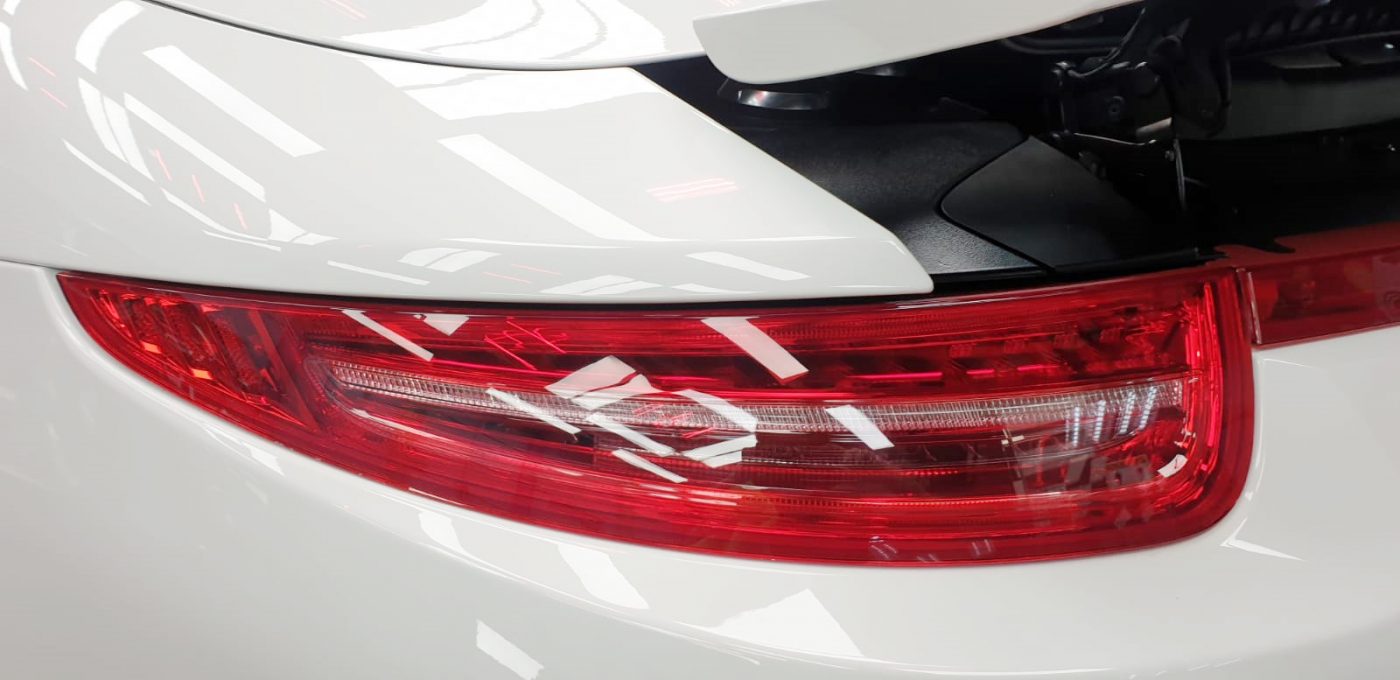Rear quarter of the 911 Targa, glossy and protected.