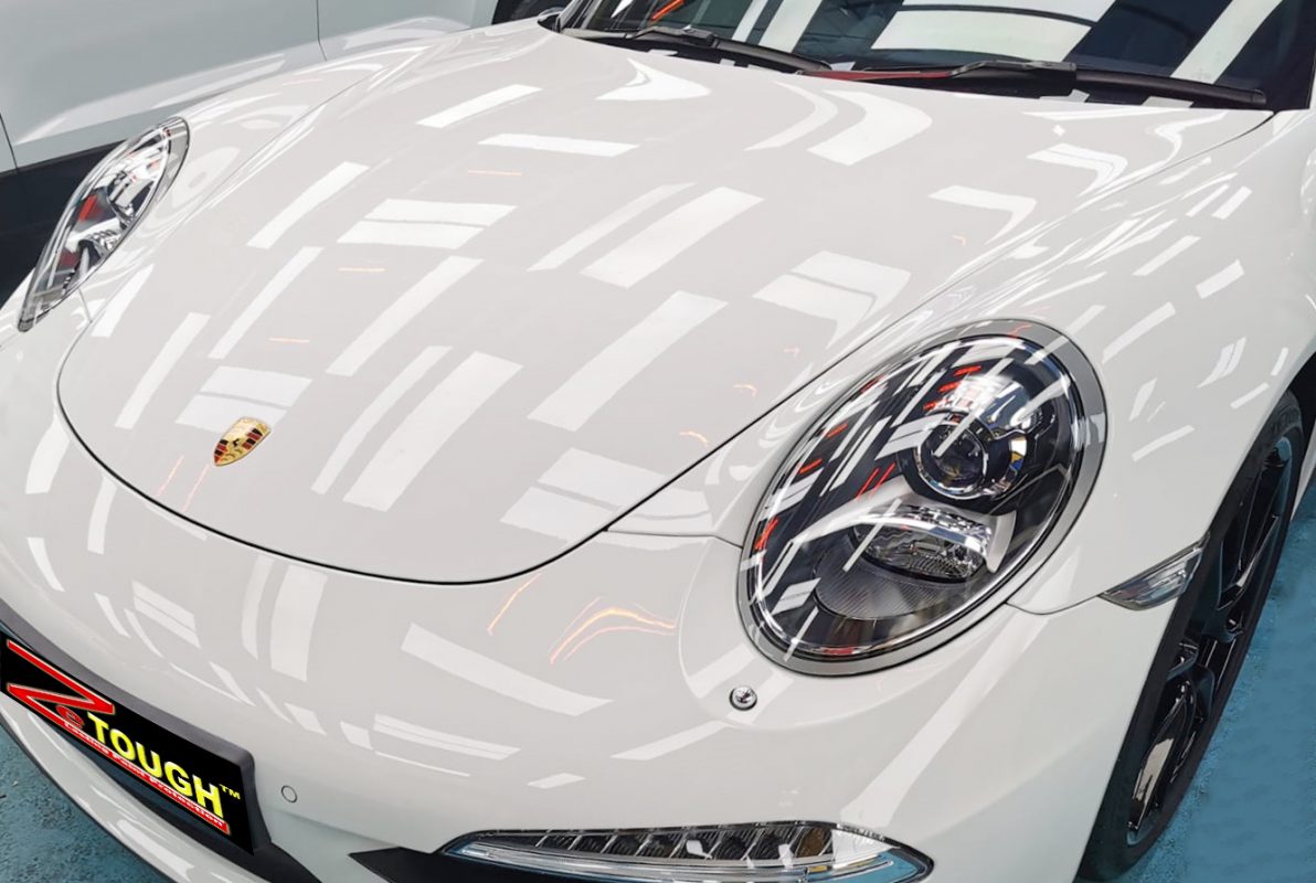 The Porsche 911 from a side angle after the titanium coating.