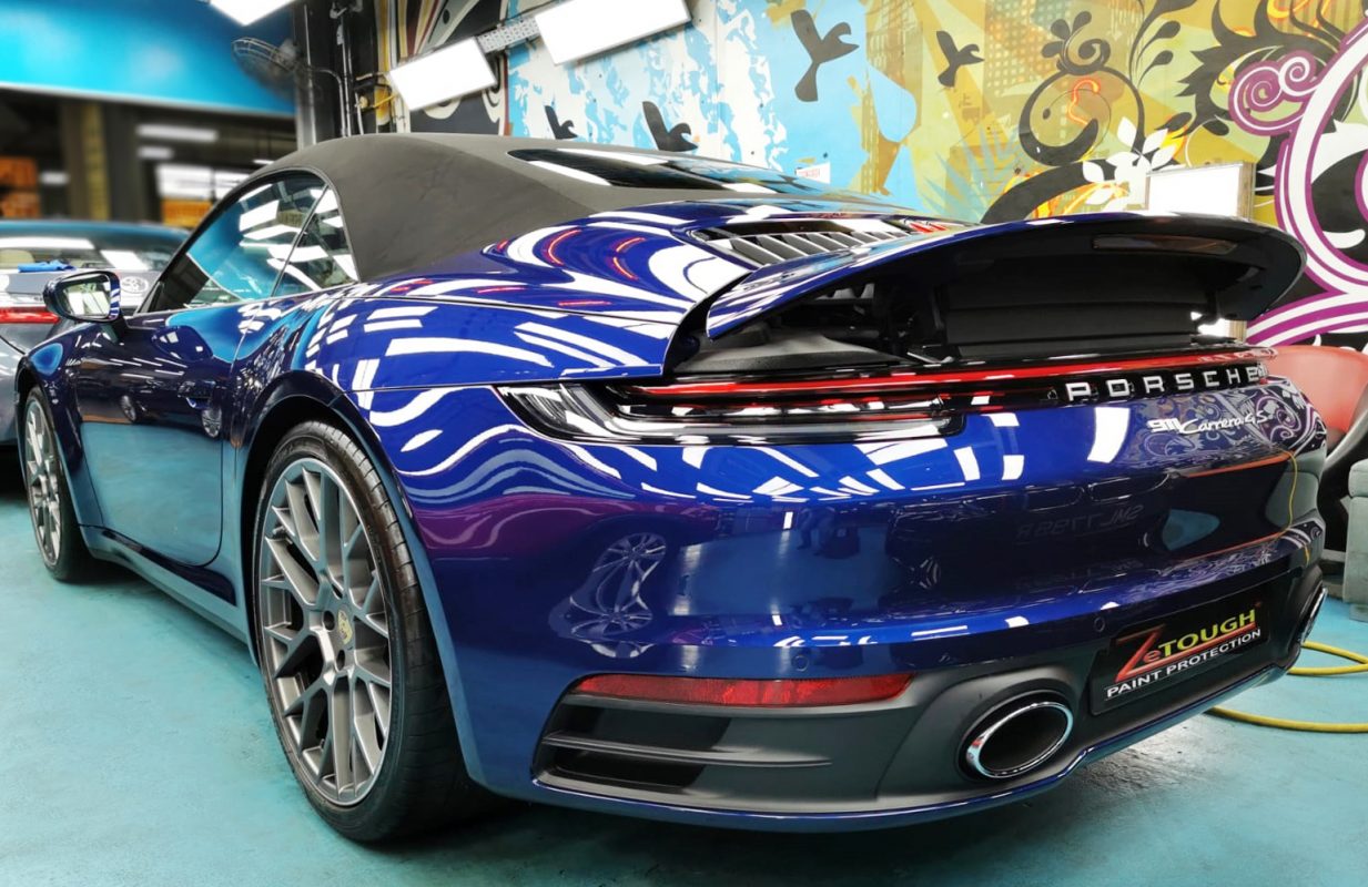 Rear quarter of the 992 Cabriolet, glossy and protected.