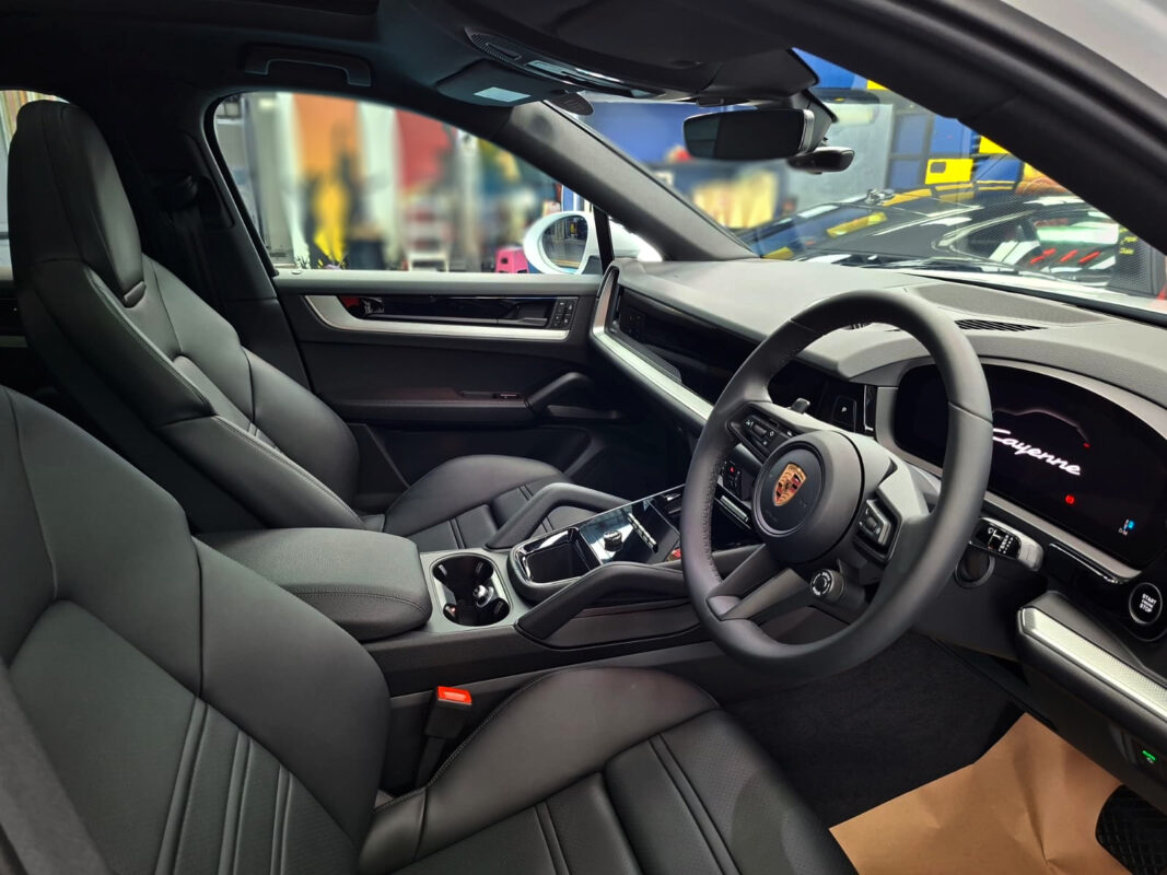 The Porsche Cayenne parked in the workshop, freshly coated.
