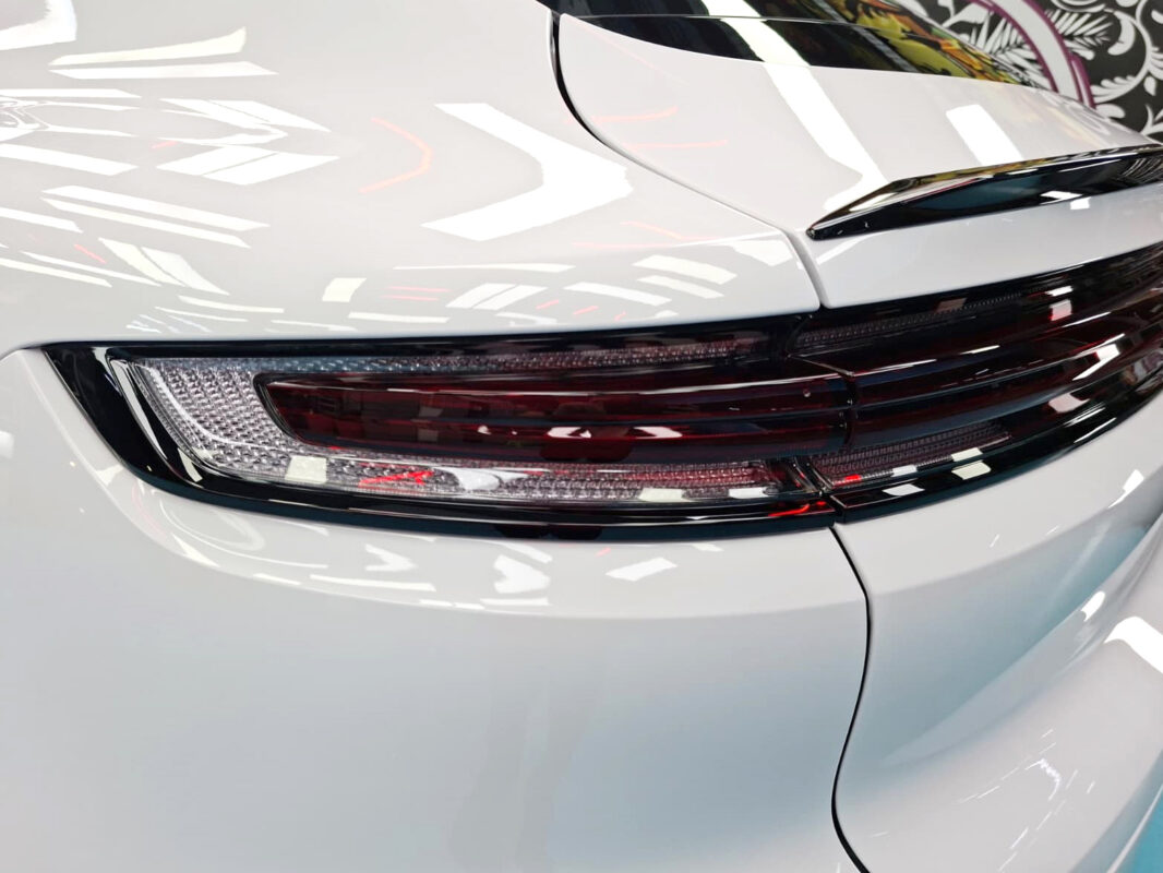 Rear quarter of the Porsche Cayenne, glossy and protected.