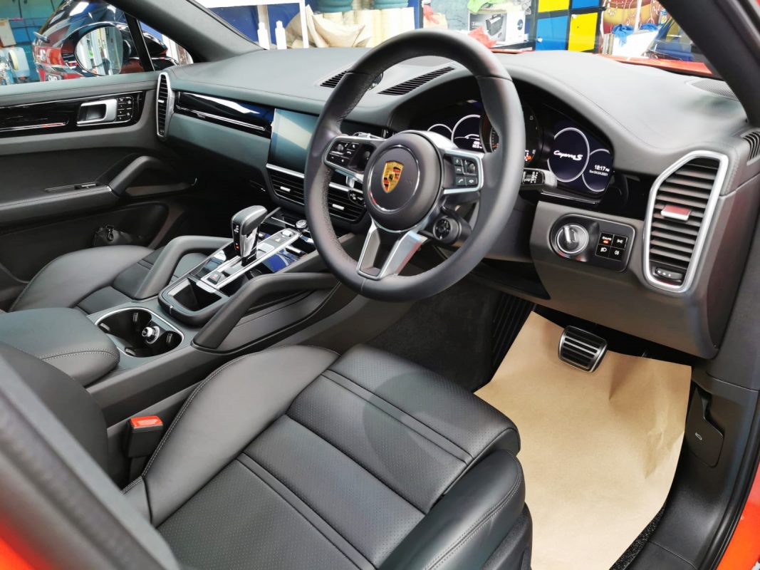 The Porsche Cayenne in the workshop, freshly coated.