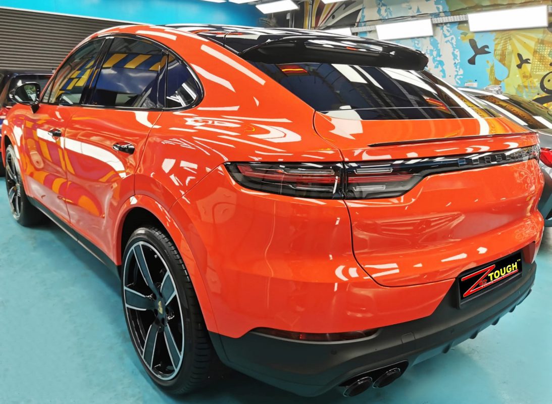 Rear quarter of the Cayenne, glossy and protected.