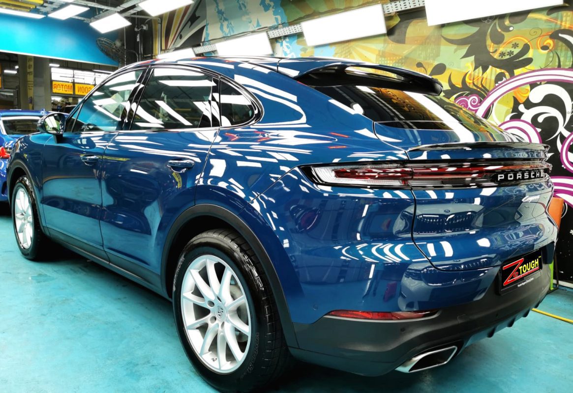 Rear quarter of the Porsche Cayenne, glossy and protected.