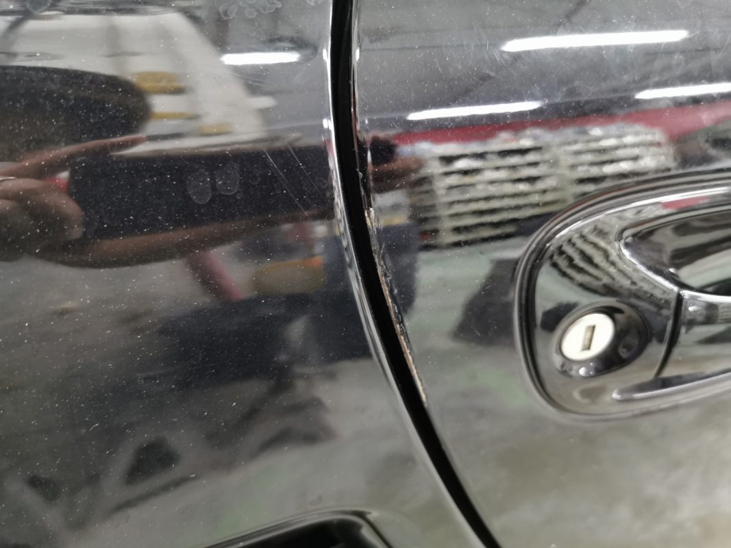 The Porsche Cayman from another angle at intake.