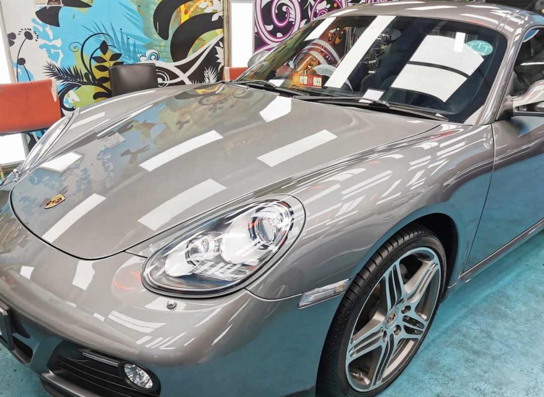 The Porsche Cayman from a side angle after the titanium coating.