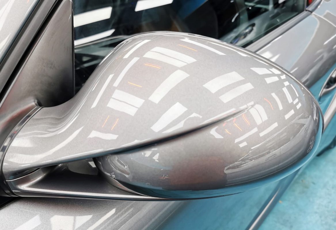 Side panel of the Cayman with the titanium finish locked in.