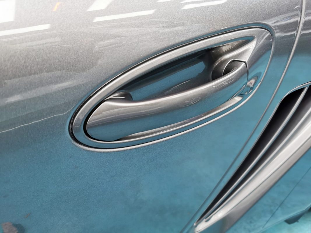 Front three-quarter view of the Porsche Cayman after coating.