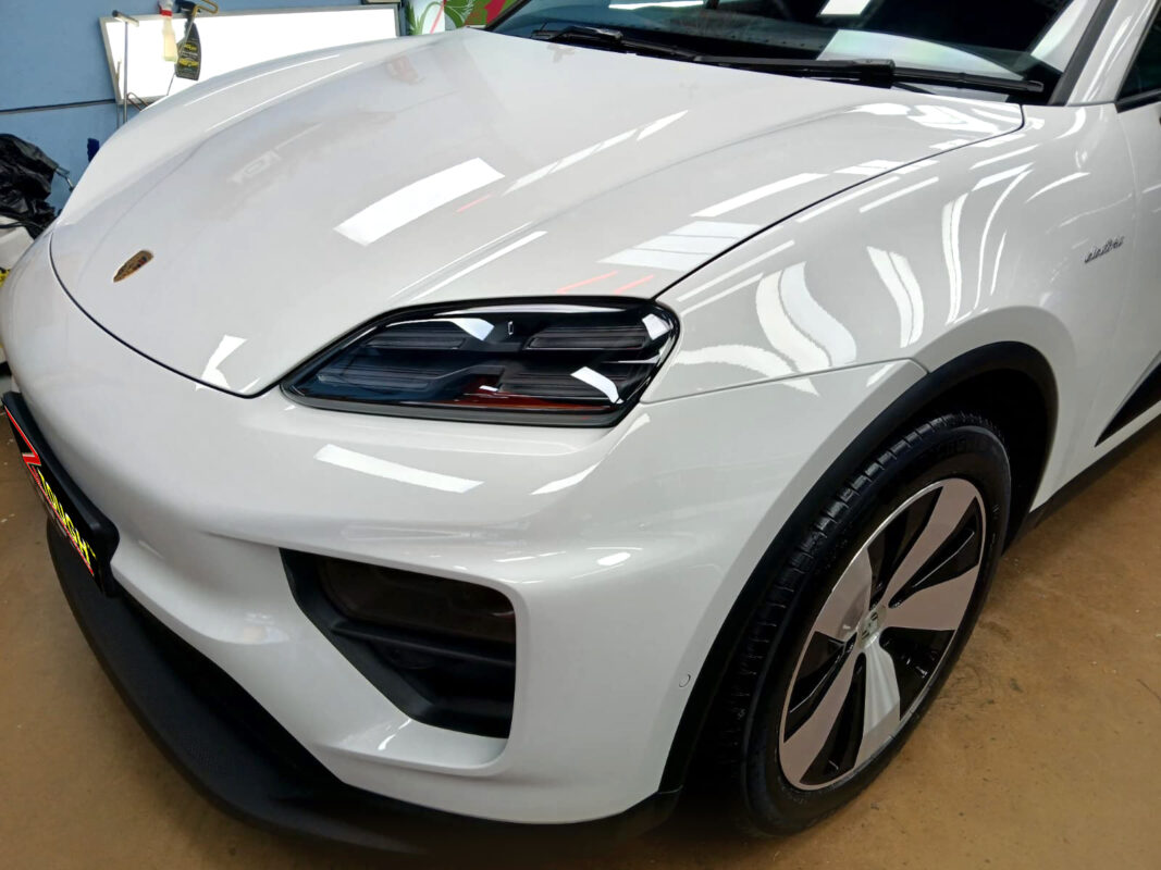 The Porsche Macan from a side angle after the ceramic coating.