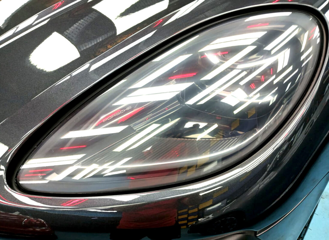 The Macan's coated paintwork holding clean reflections.