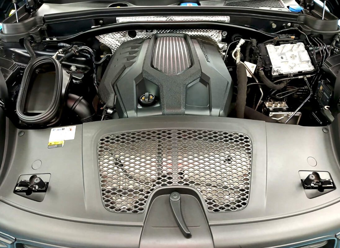 Front three-quarter view of the Porsche Macan, sealed and protected.