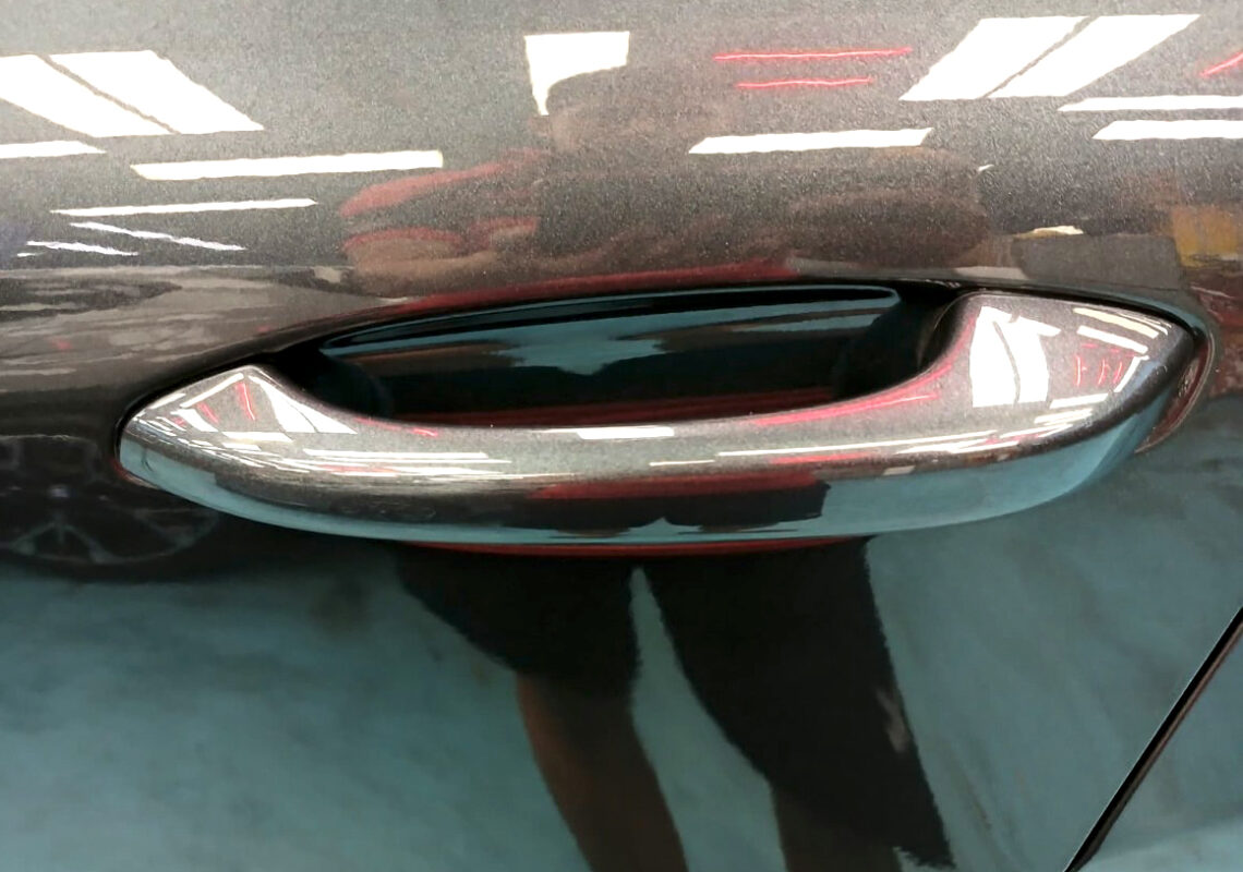 The Macan parked in the workshop, freshly coated.