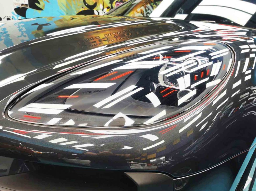 The Macan's coated paintwork showing clean reflections.