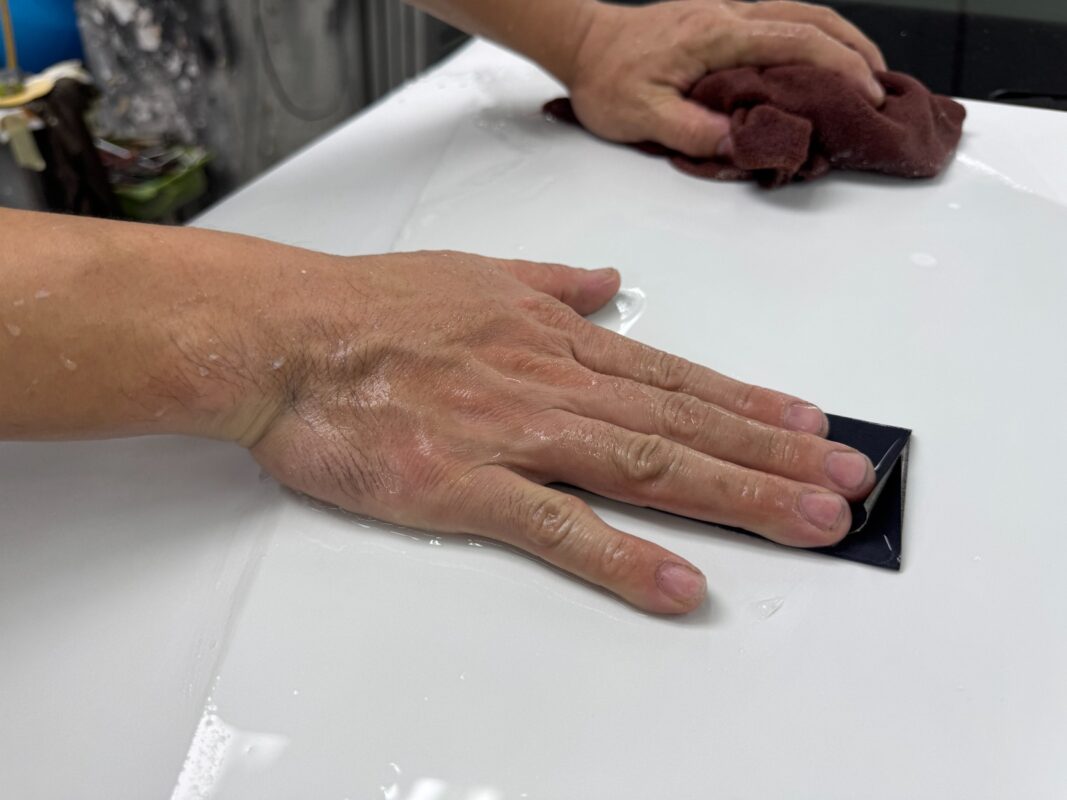 A primer coat applied to the Porsche Macan before spraying.