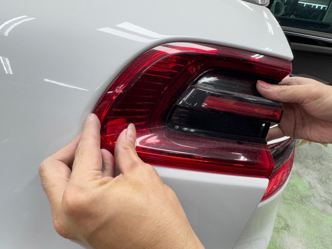 Polishing the new paint on the Porsche Macan to bring up the shine.