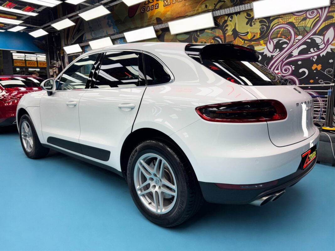 Glossy body panels on the resprayed Porsche Macan.