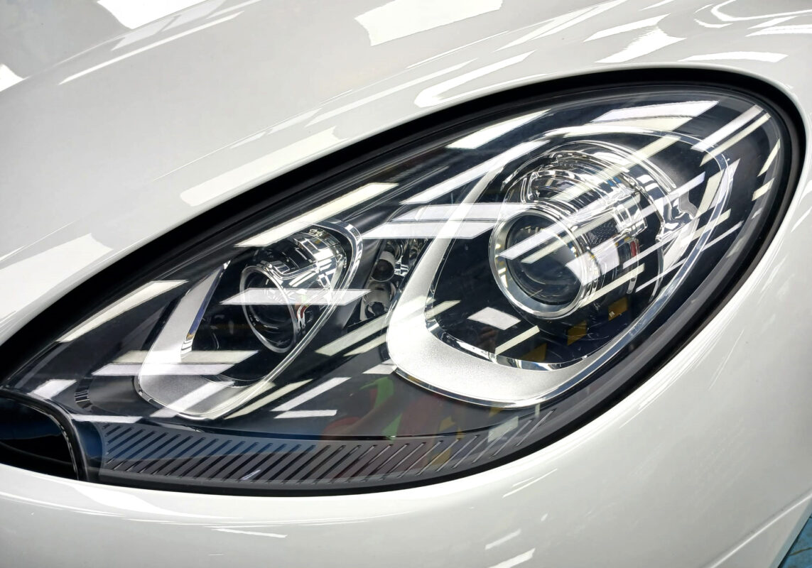The Macan's coated paintwork holding clean reflections.