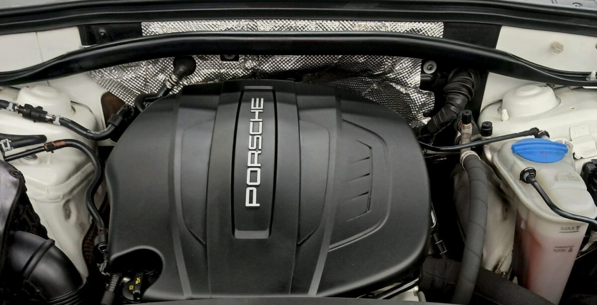 Front three-quarter view of the Porsche Macan, sealed and protected.