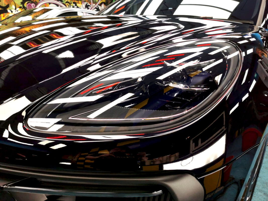 The Macan S's coated paintwork holding clean reflections.
