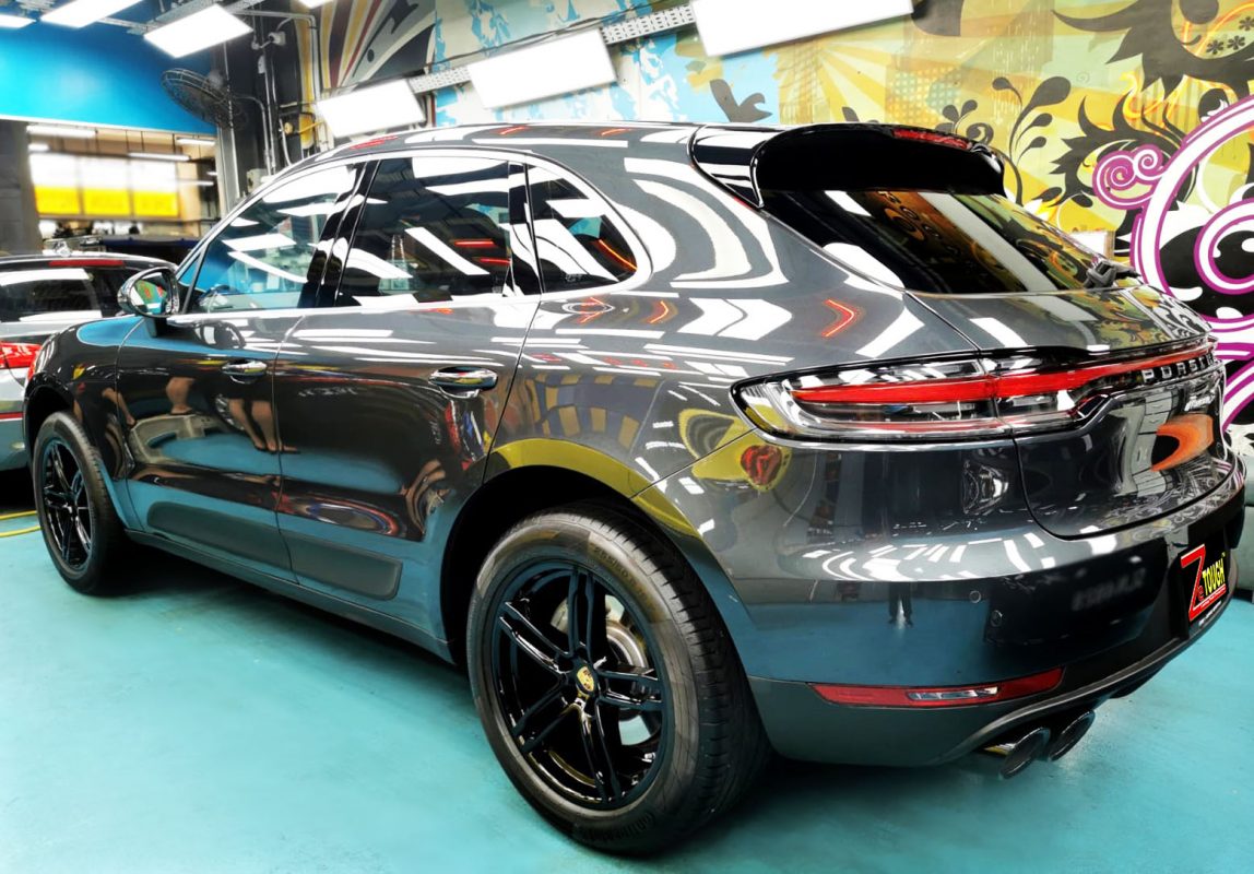 Rear quarter of the Macan S, glossy and protected.