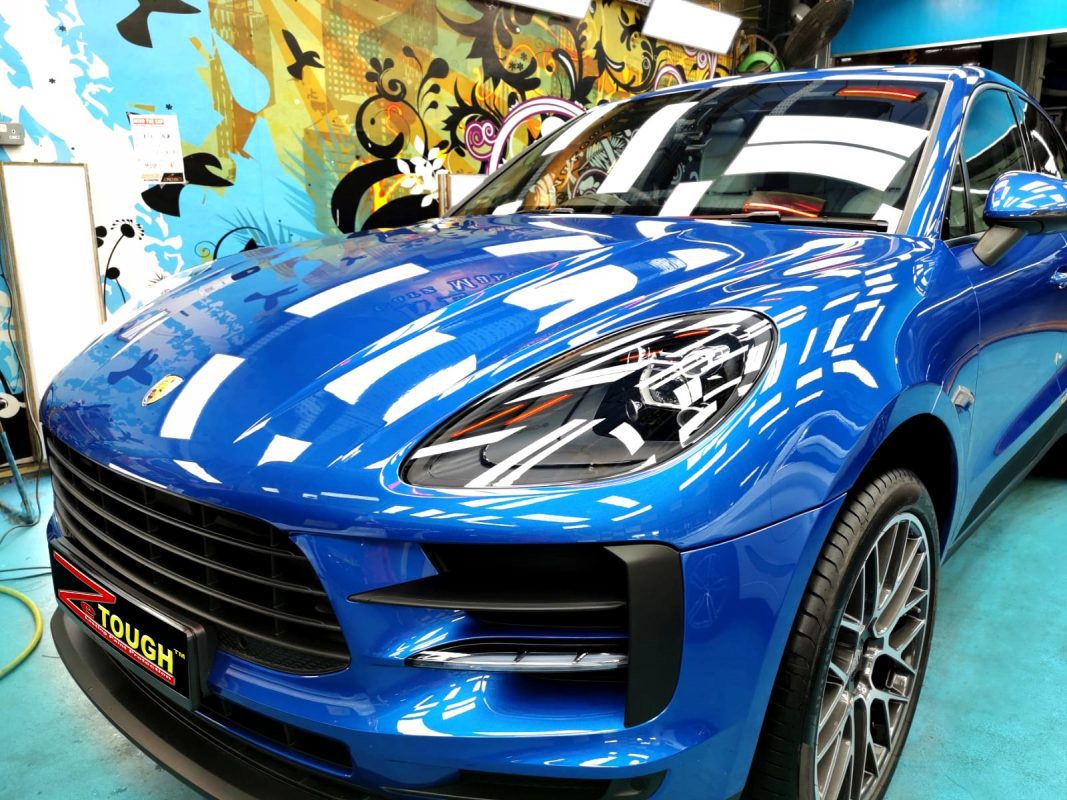 The Porsche Macan S from a side angle after the ceramic coating.