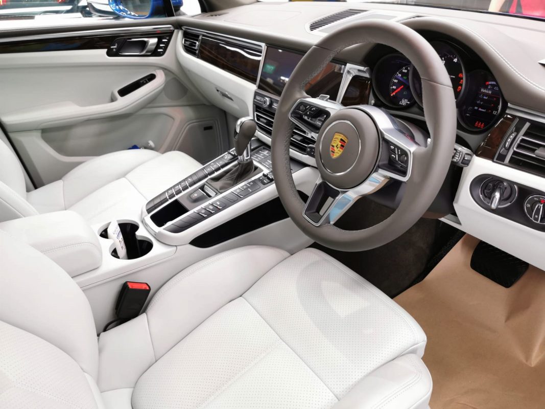 The Porsche Macan S parked in the workshop, freshly coated.