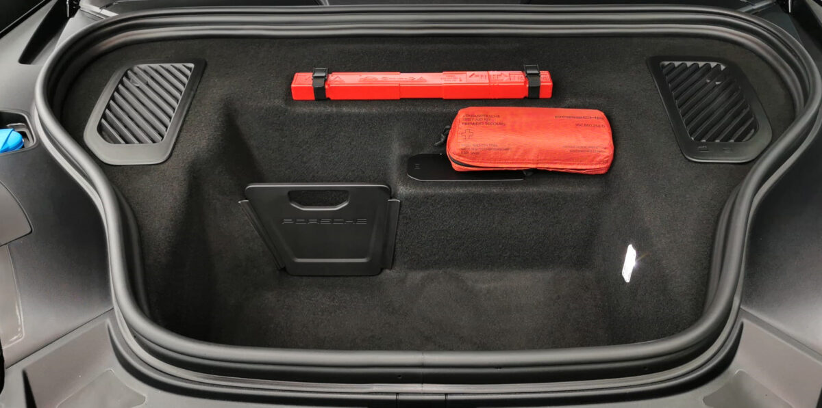 Front three-quarter view of the Porsche Macan 4, sealed and protected.