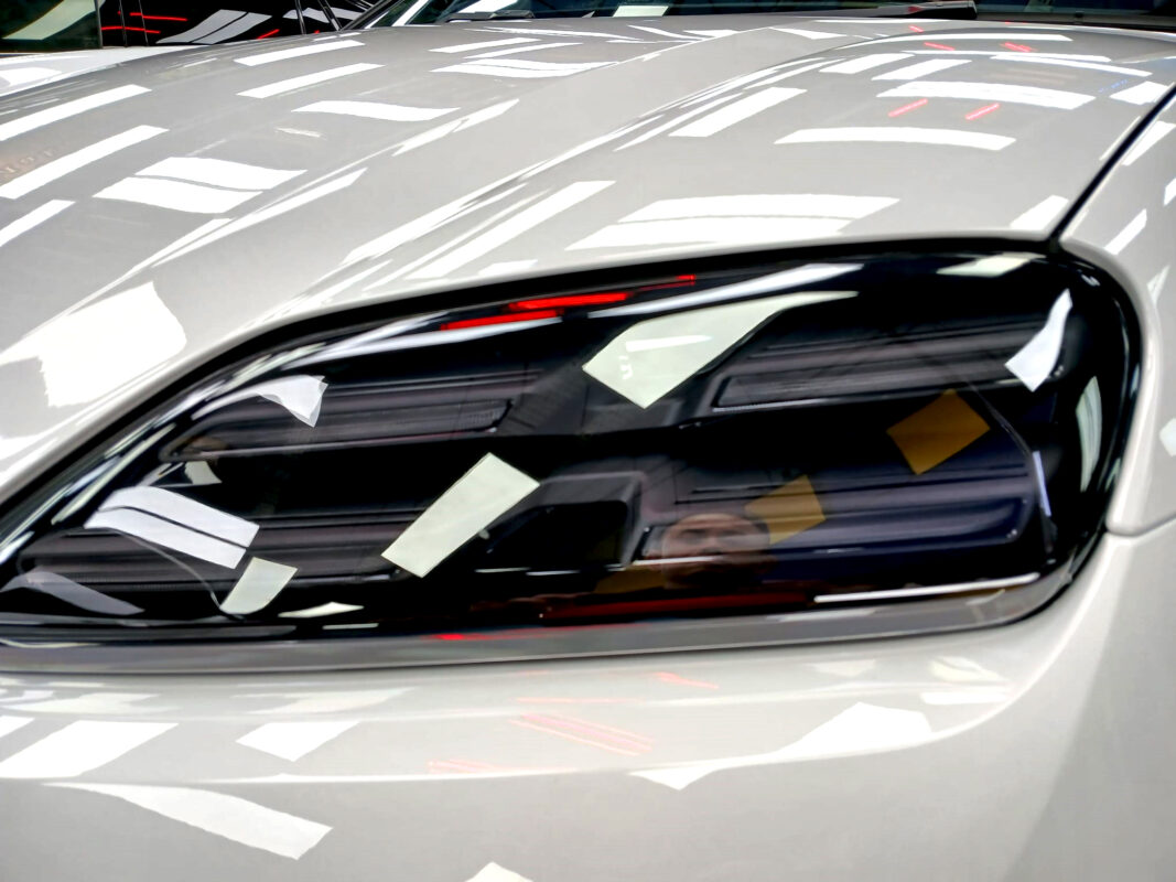 The Macan's coated paintwork holding clean reflections.