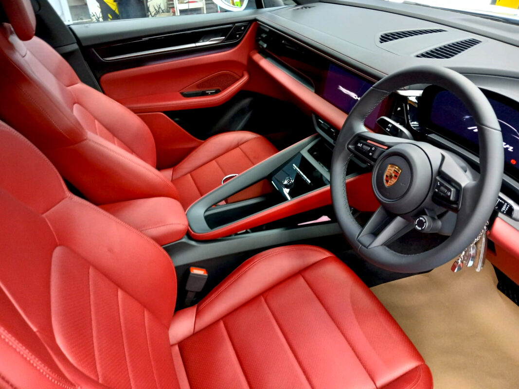 Front three-quarter view of the Porsche Macan, sealed and protected.