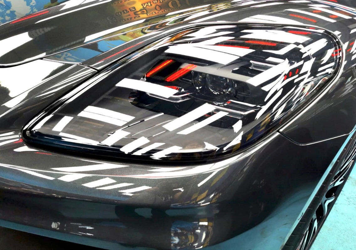 The Panamera's coated paintwork showing clean reflections.