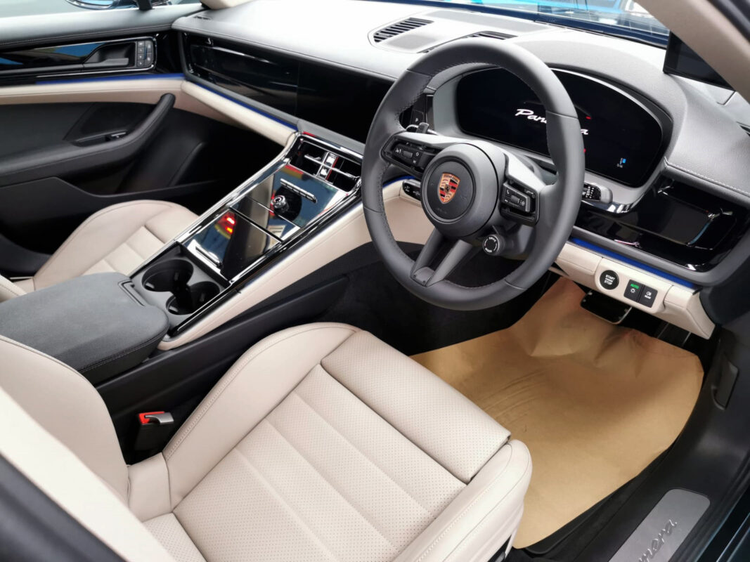 The Porsche Panamera parked in the workshop, freshly coated.