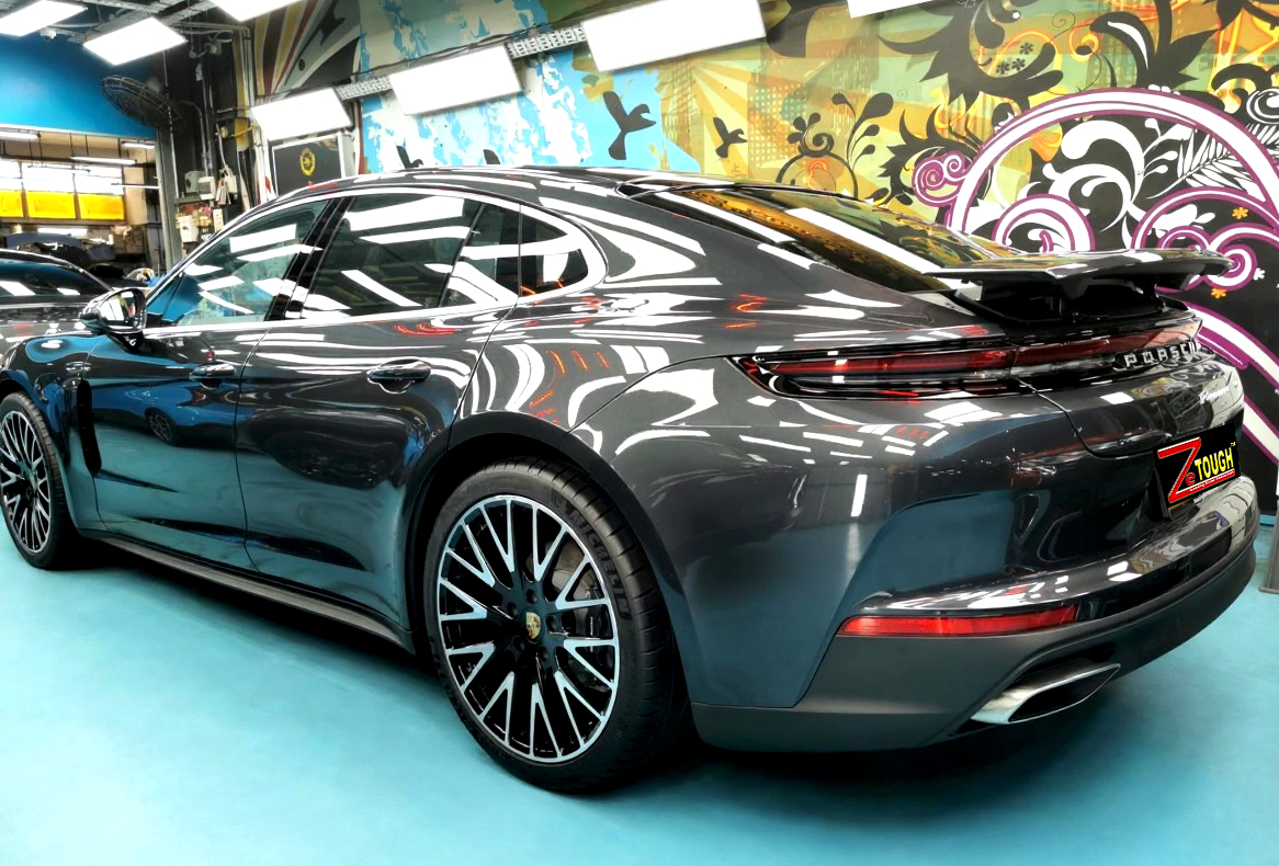 Rear quarter of the Porsche Panamera, glossy and protected.