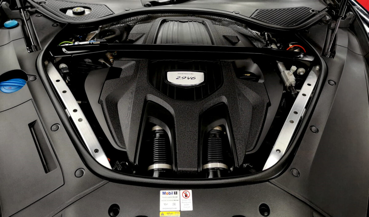 Front three-quarter view of the Porsche Panamera 4, sealed and protected.