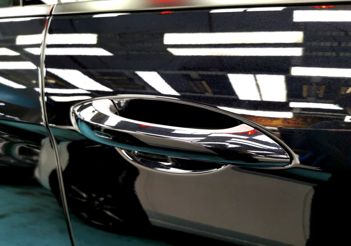 The Panamera 4 parked in the workshop, freshly coated.