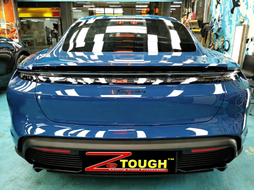 The finished Porsche Taycan, glossy and protected.