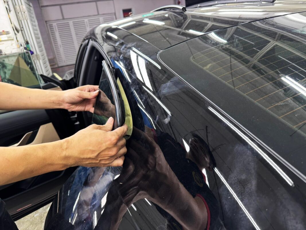 The Porsche Taycan during its respray at Revol Carz.