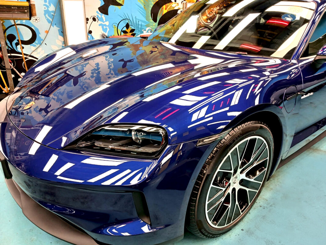 Side view of the Porsche Taycan II after the titanium coating.