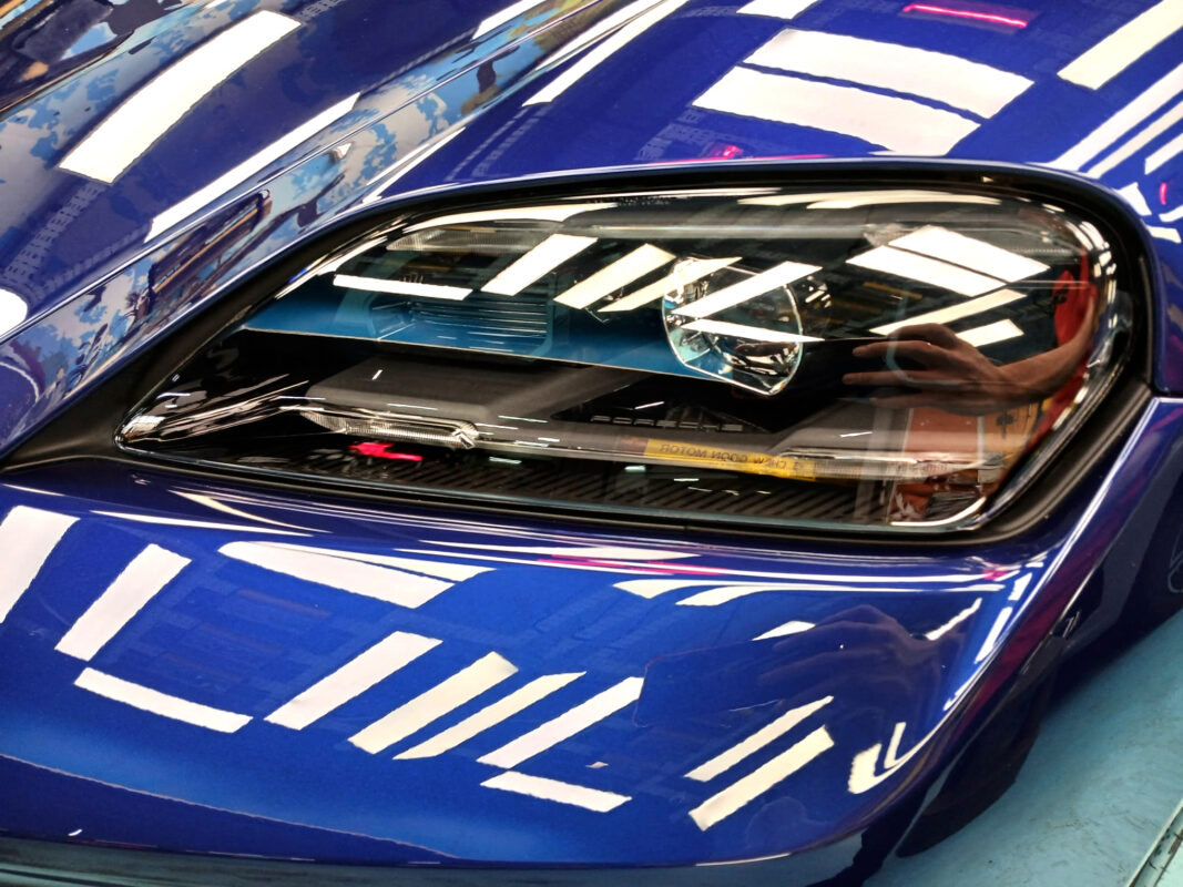 The Taycan II's coated paintwork holding clean reflections.