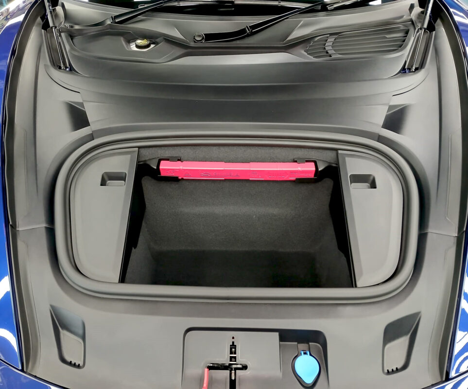 Front three-quarter view of the Porsche Taycan II, sealed and protected.