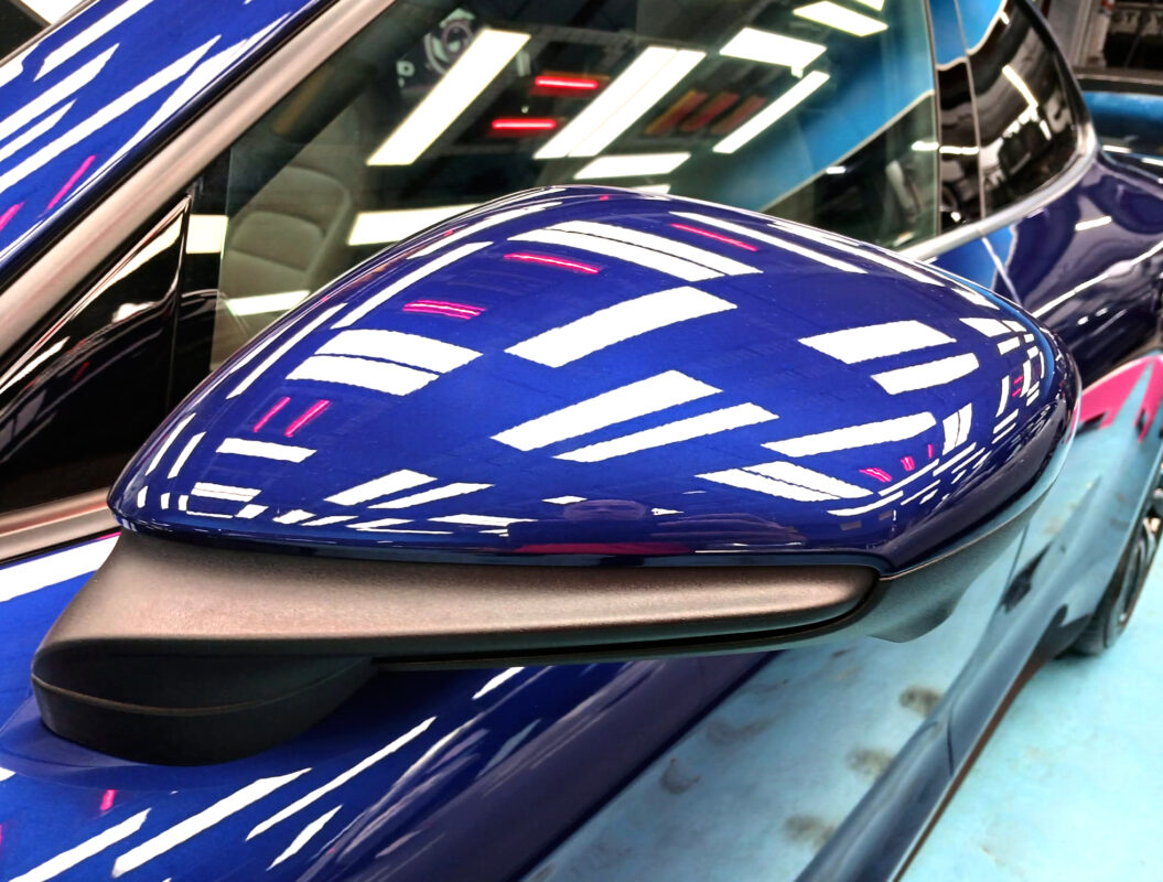 Rear quarter of the Porsche Taycan II after coating.