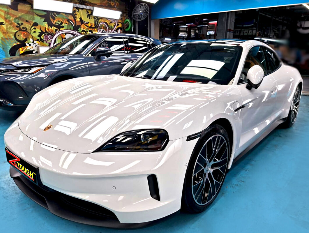 Porsche Taycan, glossy after its ZeTough Ceramic coating.