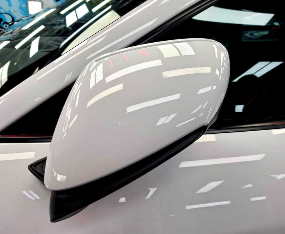 Detailed exterior of the Porsche Taycan.