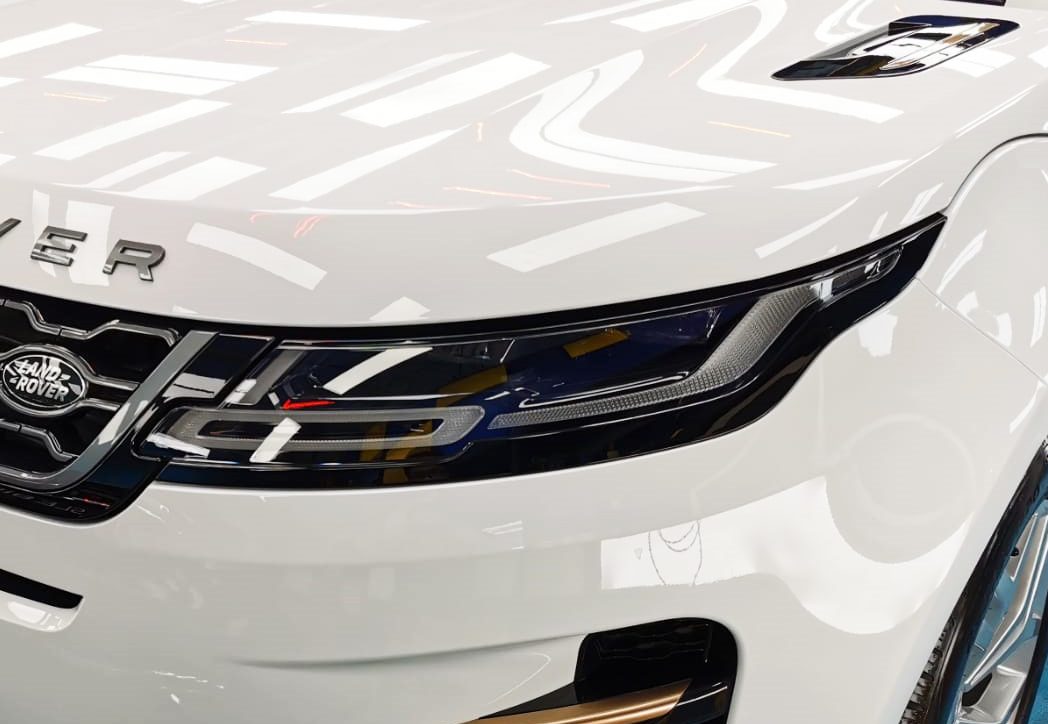 The Evoque's coated paintwork showing clean reflections.