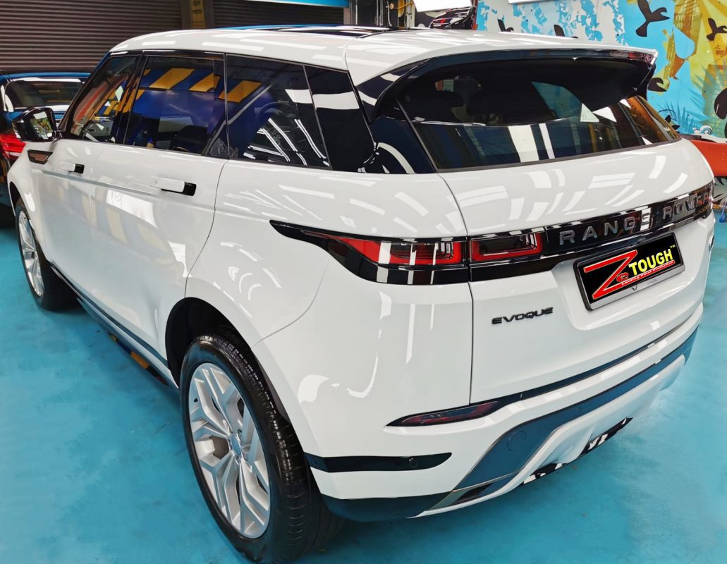 Rear quarter of the Evoque, glossy and protected.